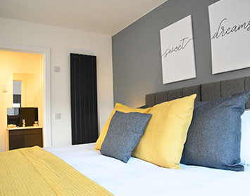 En Suite Bedroom with King Size Bed sea views private parking Luxury Apartment Portree