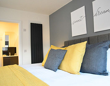 En Suite Bedroom with King Size Bed sea views private parking Luxury Apartment Portree