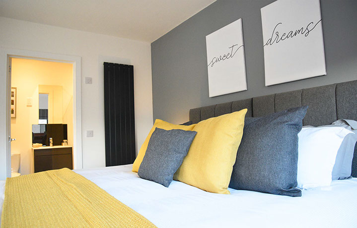 En Suite Bedroom with King Size Bed sea views private parking Luxury Apartment Portree